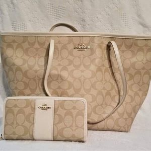 Coach logo shoulder bag and matching zip wallet